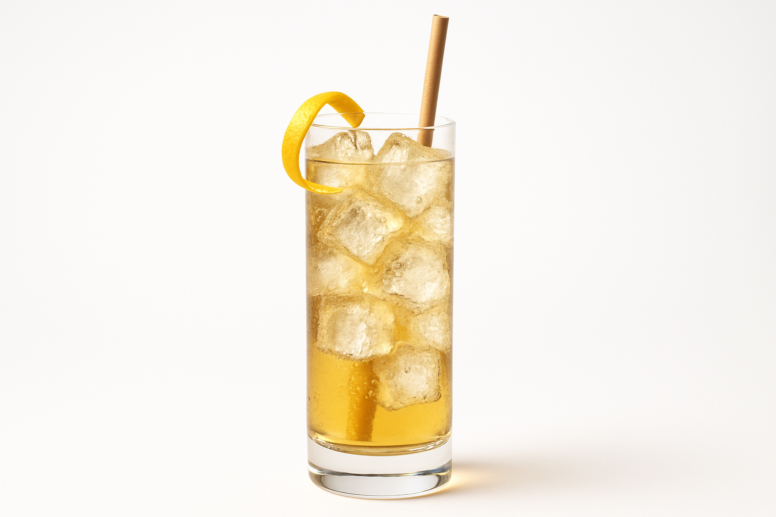 Glass of iced tea with a lemon wheel and straw on a white background